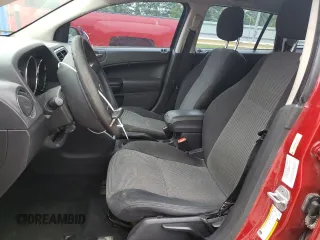 2010 Dodge Caliber SXT z VIN 1B3CB4HA3AD613799, wystawiony jako Copart lot #57339675 z przebiegiem 221 841 mil mil oraz Szkoda całkowita • Salvage title. Historia ofert i sprzedaży dostępna na DreamBid. Obrazek 7.