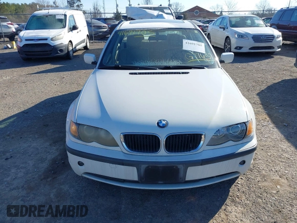 2002 BMW 3 Series 325i with VIN WBAET37492NG77657, listed as a IAAI auction lot 41691705 with 163,700 mi miles. Bid and sale history available at carsss.com. Image 6.