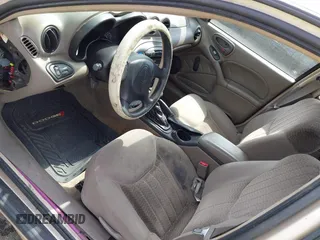 2004 Pontiac Grand Am SE z VIN 1G2NE52F64C108508, wystawiony jako IAAI lot #42143643 z przebiegiem 126 693 mil mil oraz . Historia ofert i sprzedaży dostępna na DreamBid. Obrazek 14.