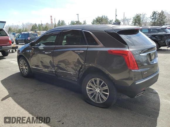 2019 Cadillac XT5 Luxury AWD with VIN 1GYKNDRS0KZ229941, listed as a Copart auction lot 49457315 with 48,856 mi miles and Salvage Title. Bid and sale history available at carsss.com. Image 2.