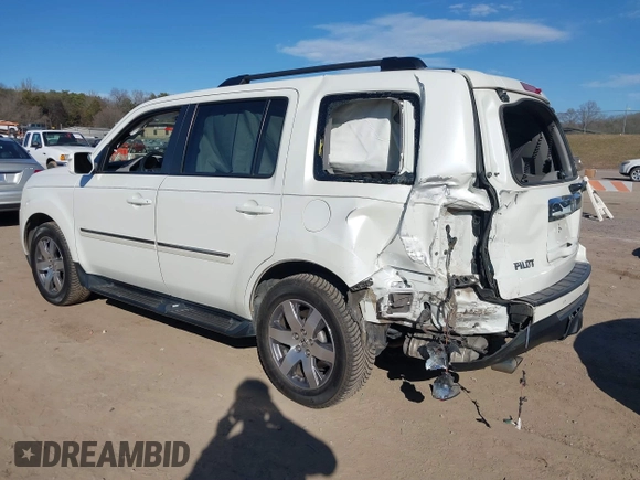 2015 Honda Pilot Touring with VIN 5FNYF3H97FB023842, listed as a IAAI auction lot 41673881 with 106,110 mi miles. Bid and sale history available at carsss.com. Image 3.