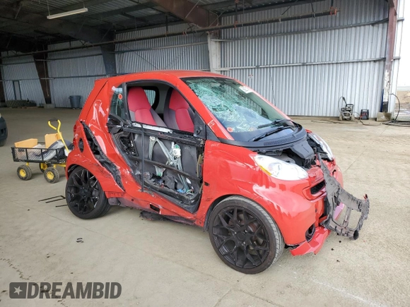 2009 Smart fortwo Pure with VIN WMEEJ31X79K249060, listed as a Copart auction lot 56927145 with Not provided miles and Salvage title. Bid and sale history available at DreamBid. Image 4.