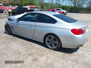 2014 BMW 4 Series 428i with VIN WBA3N7C50EK220438, listed as a IAAI auction lot 41990873 with 141,736 mi miles and . Bid and sale history available at carsss.com. Image 3.