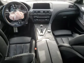 2016 BMW M6 z VIN WBS6E9C53GGF92689, wystawiony jako Copart lot #60226324 z przebiegiem Nie podano mil oraz Szkody całkowita. Historia ofert i sprzedaży dostępna na DreamBid. Obrazek 8.