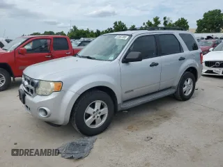 2008 Ford Escape XLS with VIN 1FMCU02Z88KE22266, listed as a Copart auction lot 63067385 with 214,026 mi miles and Salvage title. Bid and sale history available at DreamBid. Image 1.