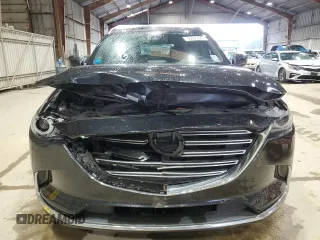 2016 Mazda CX-9 Grand Touring with VIN JM3TCADY2G0104050, listed as a Copart auction lot 56581425 with 100,737 mi miles and Salvage title. Bid and sale history available at DreamBid. Image 5.