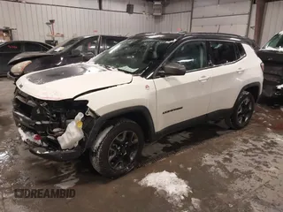 2018 Jeep Compass Trailhawk with VIN 3C4NJDDB2JT328269, listed as a IAAI auction lot 41597957 with 66,789 mi miles and . Bid and sale history available at carsss.com. Image 18.