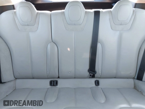 2014 Tesla Model S 60 with VIN 5YJSA1H19EFP36971, listed as a IAAI auction lot 42525811 with Not provided miles and . Bid and sale history available at DreamBid. Image 8.