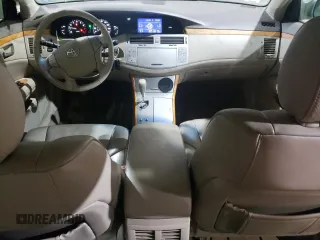 2006 Toyota Avalon XL z VIN 4T1BK36B46U090893, wystawiony jako Copart lot #60064325 z przebiegiem 142 546 mil mil oraz Czysty tytuł • Clean title. Historia ofert i sprzedaży dostępna na DreamBid. Obrazek 8.