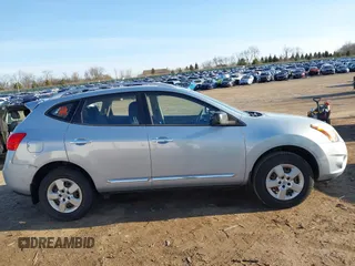 2015 Nissan Rogue S with VIN JN8AS5MVXFW261910, listed as a IAAI auction lot 41769475 with 160,783 mi miles and . Bid and sale history available at DreamBid. Image 13.
