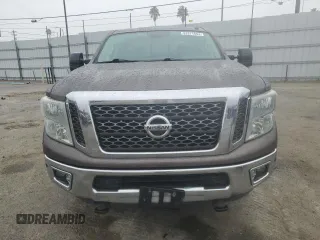 2016 Nissan Titan XD Platinum Reserve with VIN 1N6BA1F2XGN501136, listed as a Copart auction lot 82671694 with 79,469 mi miles and Salvage Title. Bid and sale history available at carsss.com. Image 5.