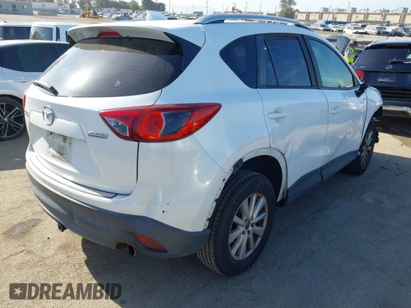 2013 Mazda CX-5 Sport with VIN JM3KE2BE4D0153251, listed as a IAAI auction lot 42297235 with 177,019 mi miles and . Bid and sale history available at DreamBid. Image 4.