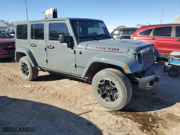 2015 Jeep Wrangler Unlimited Rubicon Hard Rock with VIN 1C4BJWFG4FL634934, listed as a Copart auction lot 80684904 with 70,700 mi miles and Salvage Title. Bid and sale history available at carsss.com. Image 4.