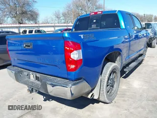 2016 Toyota Tundra SR z VIN 5TFRM5F13GX095535, wystawiony jako IAAI lot #41618316 z przebiegiem 131 386 mil mil oraz . Historia ofert i sprzedaży dostępna na DreamBid. Obrazek 4.