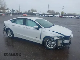 2018 Ford Fusion SE z VIN 3FA6P0LU7JR195171, wystawiony jako IAAI lot #40776821 z przebiegiem 63 624 mil mil oraz . Historia ofert i sprzedaży dostępna na DreamBid. Obrazek 1.