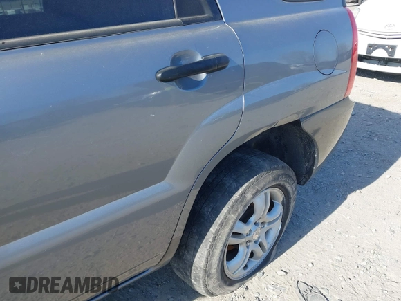 2008 Kia Sportage LX with VIN KNDJE723487455152, listed as a IAAI auction lot 41638720 with 247,286 mi miles. Bid and sale history available at carsss.com. Image 6.