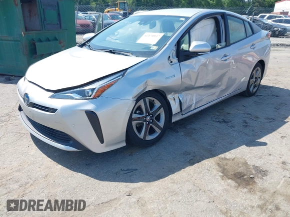 2021 Toyota Prius L Eco z VIN JTDKAMFU5M3137298, wystawiony jako IAAI lot #42270937 z przebiegiem 38 828 mil mil oraz . Historia ofert i sprzedaży dostępna na DreamBid. Obrazek 16.
