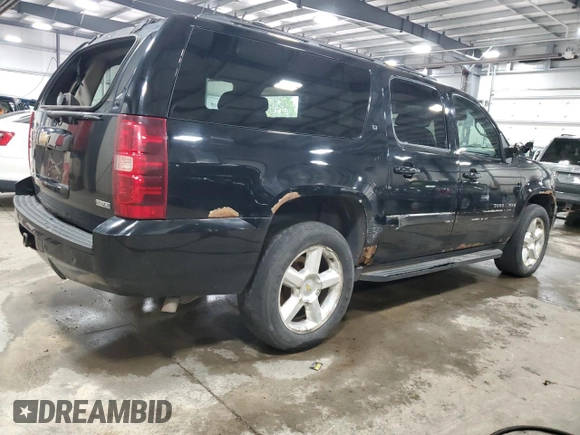 2009 Chevrolet Suburban LT w/2LT with VIN 1GNFK26319J124911, listed as a Copart auction lot 53263455 with 215,826 mi miles and Salvage Title. Bid and sale history available at carsss.com. Image 3.