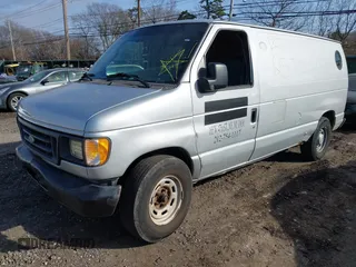 2006 Ford Econoline Cargo with VIN 1FTRE14W36HA38006, listed as a IAAI auction lot 41804095 with Not Provided miles. Bid and sale history available at carsss.com. Image 2.