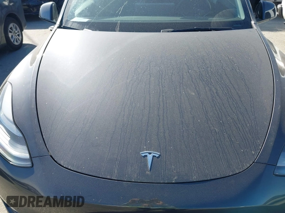 2025 Tesla Model Y Long Range with VIN 7SAYGDED2SF228414, listed as a IAAI auction lot 41706470 with 11,319 mi miles and . Bid and sale history available at DreamBid. Image 10.