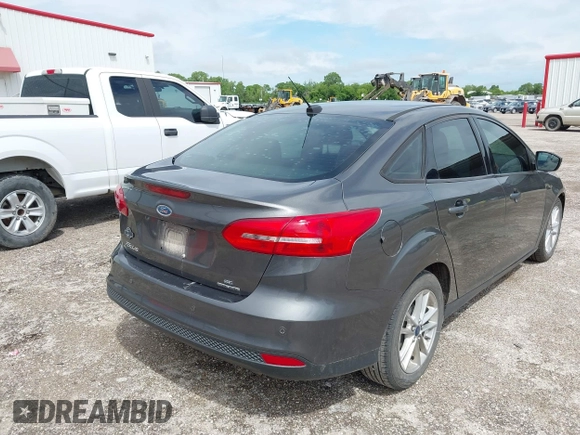2016 Ford Focus SE with VIN 1FADP3F20GL202777, listed as a IAAI auction lot 42077501 with 116,351 mi miles and . Bid and sale history available at DreamBid. Image 4.