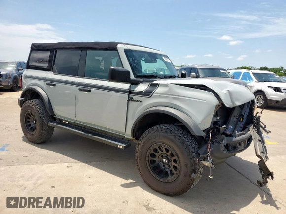 2021 Ford Bronco with VIN 1FMDE5BHXMLA97789, listed as a Copart auction lot 59548025 with 93,959 mi miles and Salvage title. Bid and sale history available at DreamBid. Image 4.
