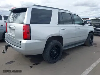 2018 Chevrolet Tahoe LT with VIN 1GNSCBKC2JR115318, listed as a IAAI auction lot 41809253 with 107,217 mi miles. Bid and sale history available at carsss.com. Image 4.