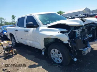 2023 Toyota Tundra SR with VIN 5TFKB5DB0PX065072, listed as a IAAI auction lot 42226348 with 53,539 mi miles and . Bid and sale history available at DreamBid. Image 1.