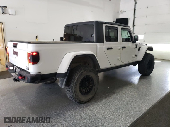 2020 Jeep Gladiator Rubicon with VIN 1C6JJTBG8LL121687, listed as a Copart auction lot 66404935 with 52,884 mi miles and Clean title. Bid and sale history available at DreamBid. Image 3.