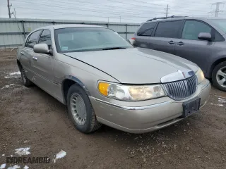 2001 Lincoln Town Car Executive with VIN 1LNHM81W31Y733358, listed as a Copart auction lot 85582644 with 88,418 mi miles and Salvage Title. Bid and sale history available at carsss.com. Image 4.