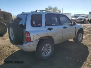 1999 Suzuki Grand Vitara JLX z VIN JS3TD62V0X4113058, wystawiony jako Copart lot #80089884 z przebiegiem 165 794 mil mil oraz Szkoda całkowita • Salvage title. Historia ofert i sprzedaży dostępna na DreamBid. Obrazek 3.