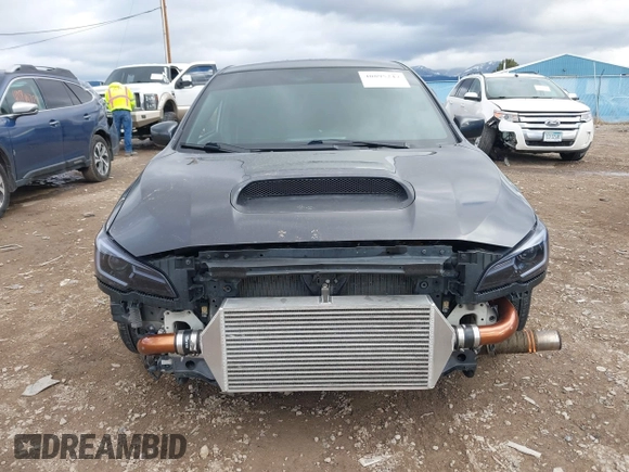 2015 Subaru WRX with VIN JF1VA1A65F9818409, listed as a IAAI auction lot 40895247 with 73,273 mi miles. Bid and sale history available at carsss.com. Image 6.