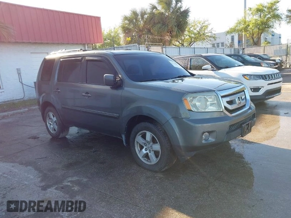 2009 Honda Pilot EX-L with VIN 5FNYF48579B014520, listed as a IAAI auction lot 41736577 with 204,704 mi miles. Bid and sale history available at carsss.com. Image 1.