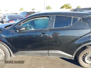 2021 Toyota C-HR LE with VIN JTNKHMBX9M1116943, listed as a IAAI auction lot 41369464 with Not Provided miles. Bid and sale history available at carsss.com. Image 15.