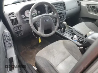 2006 Ford Escape XLS with VIN 1FMYU02Z66KA18952, listed as a Copart auction lot 60472305 with 221,258 mi miles and Salvage title. Bid and sale history available at DreamBid. Image 8.