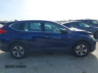 2019 Honda CR-V LX with VIN 5J6RW5H32KL003561, listed as a IAAI auction lot 41872089 with 65,146 mi miles and . Bid and sale history available at carsss.com. Image 13.