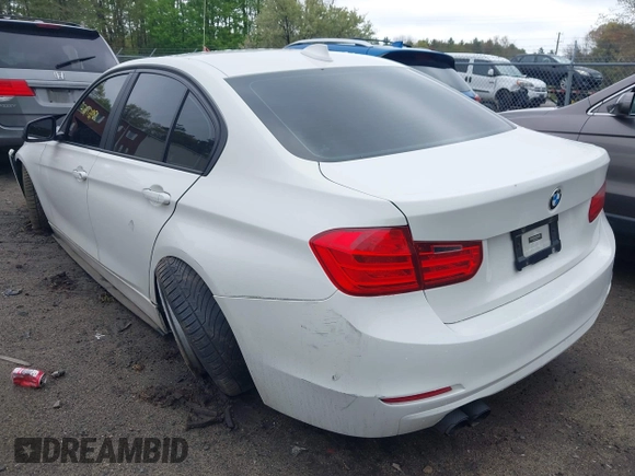 2014 BMW 3 Series 328i xDrive with VIN WBA3B5C56EP544400, listed as a IAAI auction lot 42172100 with 242,472 mi miles. Bid and sale history available at carsss.com. Image 3.