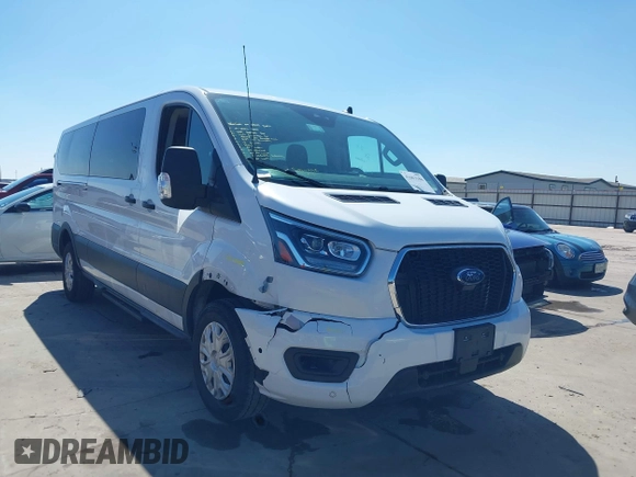 2023 Ford Transit Passenger XL с VIN 1FBAX2YG2PKA59910, выставлен на аукционе IAAI как лот 41663186 с пробегом 60 803 миль миль и . История ставок и продаж доступна на DreamBid. Изображение 1.