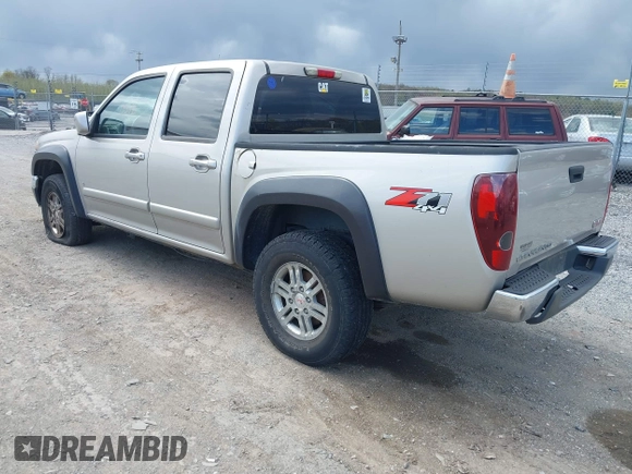 2009 GMC Canyon SLE1 z VIN 1GTDT13E398100890, wystawiony jako IAAI lot #42030572 z przebiegiem 160 181 mil mil oraz . Historia ofert i sprzedaży dostępna na DreamBid. Obrazek 3.
