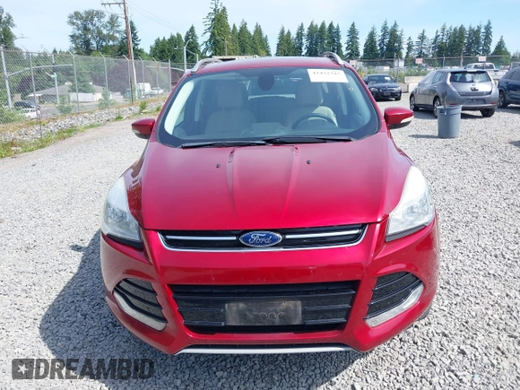 2015 Ford Escape Titanium with VIN 1FMCU9J93FUB28037, listed as a IAAI auction lot 42432345 with 133,242 mi miles and . Bid and sale history available at DreamBid. Image 12.