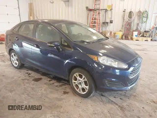 2016 Ford Fiesta SE z VIN 3FADP4BJ3GM144410, wystawiony jako IAAI lot #42408510 z przebiegiem 157 037 mil mil oraz . Historia ofert i sprzedaży dostępna na DreamBid. Obrazek 1.