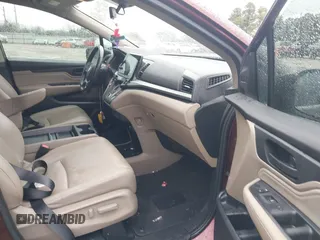 2019 Honda Odyssey Touring with VIN 5FNRL6H82KB060023, listed as a IAAI auction lot 41451199 with 82,994 mi miles. Bid and sale history available at carsss.com. Image 5.