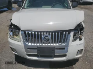 2009 Mercury Mariner z VIN 4M2CU81769KJ21980, wystawiony jako Copart lot #58489295 z przebiegiem 281 640 mil mil oraz Szkody całkowita. Historia ofert i sprzedaży dostępna na DreamBid. Obrazek 12.