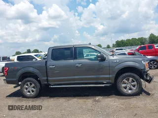 2019 Ford F-150 XL with VIN 1FTEW1E52KKE98899, listed as a IAAI auction lot 42576904 with 168,223 mi miles and . Bid and sale history available at DreamBid. Image 14.