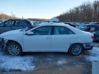 2014 Toyota Camry Hybrid LE with VIN 4T1BD1FK7EU114181, listed as a IAAI auction lot 41294936 with 115,986 mi miles. Bid and sale history available at carsss.com. Image 14.