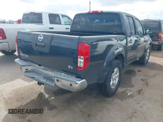 2013 Nissan Frontier SV with VIN 1N6AD0ER3DN746142, listed as a IAAI auction lot 41519017 with 166,482 mi miles and . Bid and sale history available at DreamBid. Image 4.