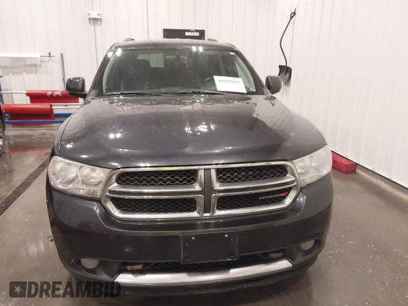 2013 Dodge Durango Crew with VIN 1C4RDJDGXDC691311, listed as a IAAI auction lot 41642267 with 167,098 mi miles and . Bid and sale history available at DreamBid. Image 13.