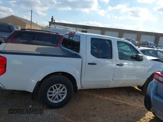 2020 Nissan Frontier SV z VIN 1N6ED0EB6LN700890, wystawiony jako IAAI lot #41162853 z przebiegiem 62 192 mil mil oraz . Historia ofert i sprzedaży dostępna na DreamBid. Obrazek 13.