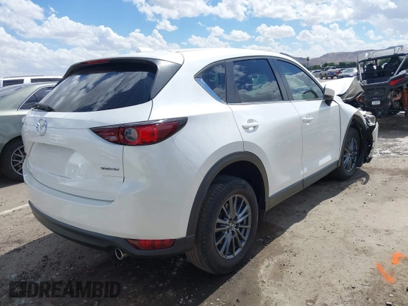2020 Mazda CX-5 Sport with VIN JM3KFABM1L1752583, listed as a IAAI auction lot 40349125 with 50,134 mi miles. Bid and sale history available at carsss.com. Image 4.