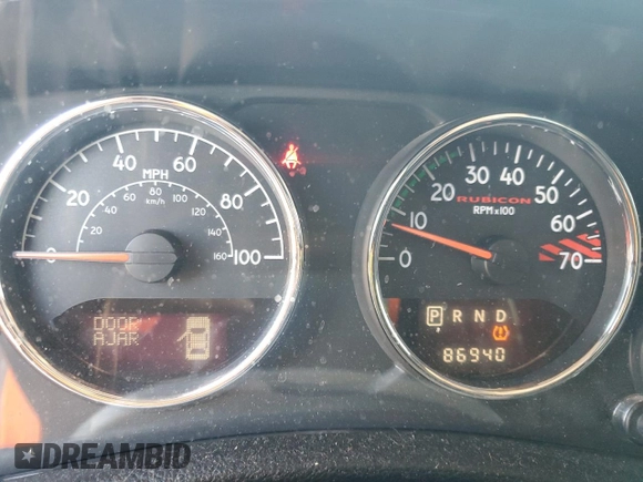2014 Jeep Wrangler Unlimited Rubicon with VIN 1C4HJWFG9EL199501, listed as a Copart auction lot 61443595 with 86,940 mi miles and Salvage title. Bid and sale history available at DreamBid. Image 9.